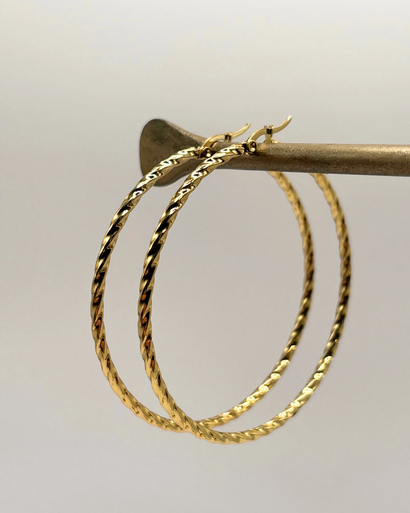 Golden big twisted hoops